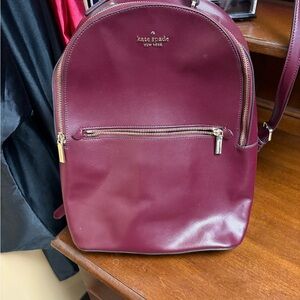 Kate Spade Wine Red Backpack with Gold Accents